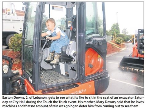 Child in Construction Equipment during Touch the Truck event Opens in new window